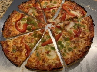 Homemade Bar Pizza - Pepper and Onion - Just sliced Homemade Bar Pizza - Pepper and Onion - Just sliced