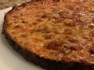 South shore bar pizza laced edges mozzarella cheddar plain crust closeup 3